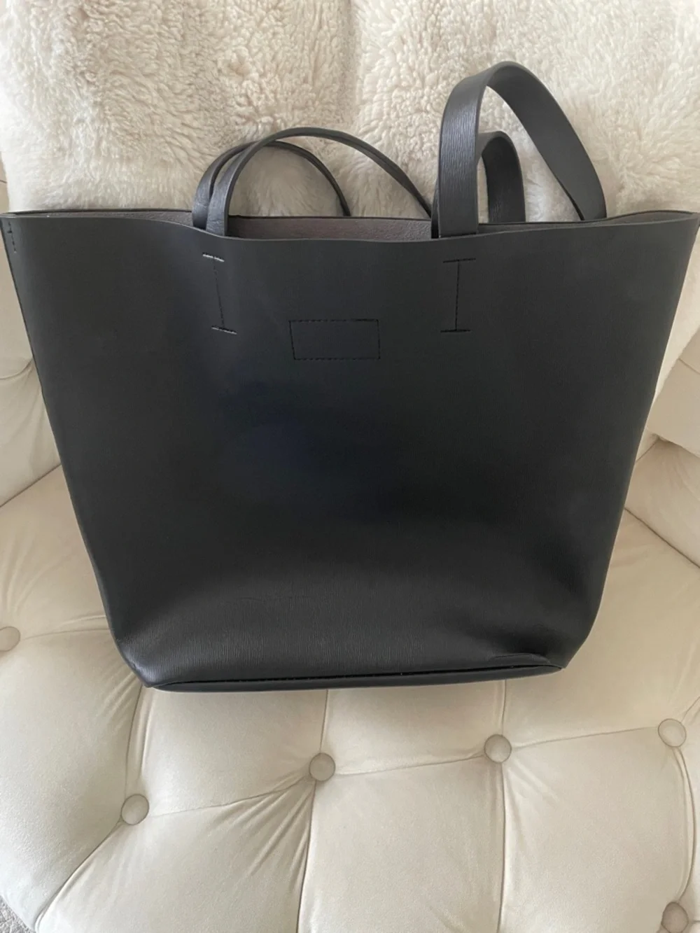 Neiman Marcus black faux leather tote bag with front pockets